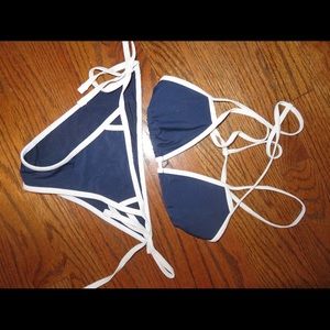 Blue bikini with white trim